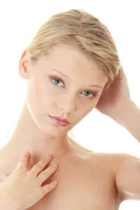 Portrait of a beautiful young woman over white background