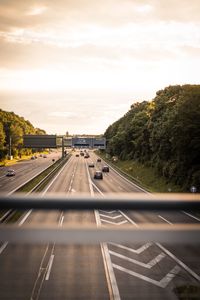 Cars on road against sky