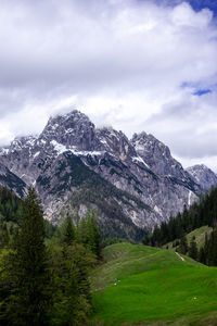 Scenic view of snowcapped mountains against sky