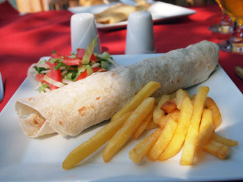 Close-up of food served on table