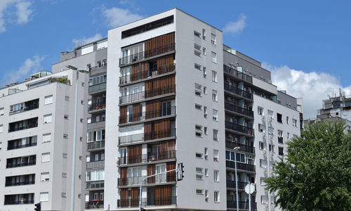 Exterior of a new, modern apartment building in urban area