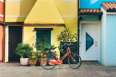 Bicycle parked outside house