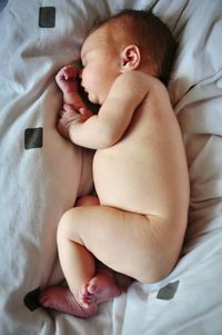 High angle view of baby sleeping