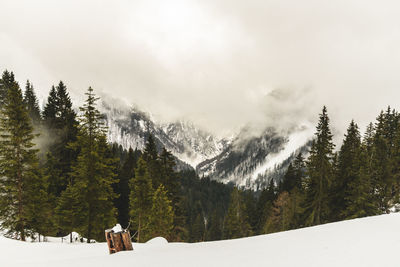 Scenic view of mountains against sky during winter