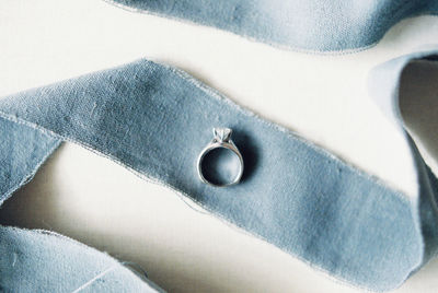 Close-up of person wearing canvas shoes