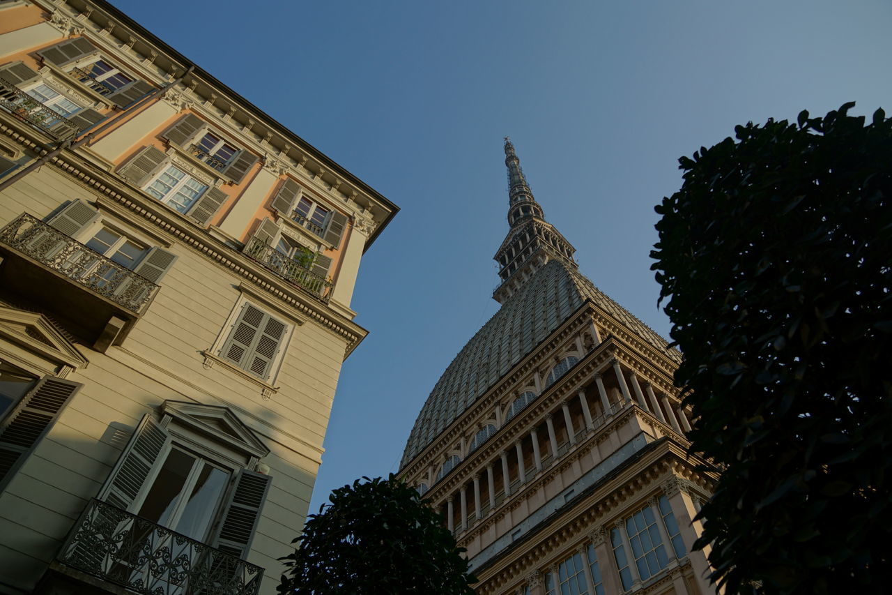 LOW ANGLE VIEW OF HISTORICAL BUILDING AGAINST CLEAR SKY