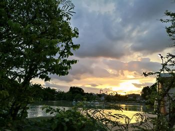 Scenic view of lake against sky during sunset