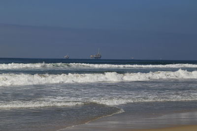Scenic view of sea against clear sky