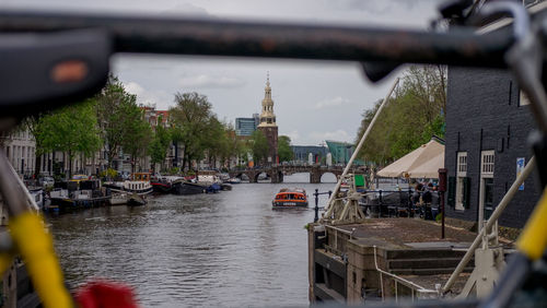 Boats moored at harbor