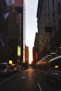 City street amidst buildings against sky