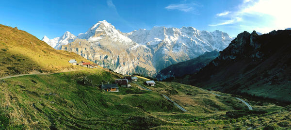 Scenic view of snowcapped mountains against sky