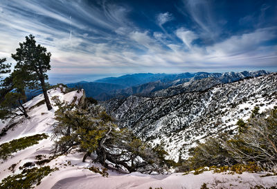 Scenic view of mountains against sky during winter