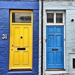 Yellow blue door of building