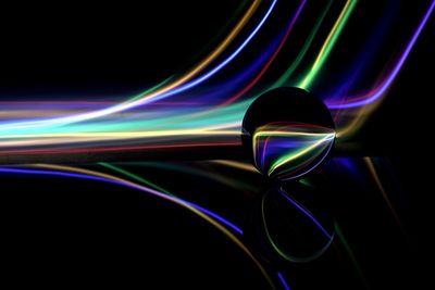Light trails over black background