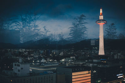 Illuminated buildings in city at night