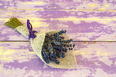 Beautiful bunch or bouquet of lavender flowers on a wooden table