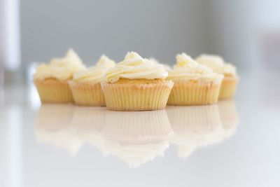 Close-up of cupcakes over white background