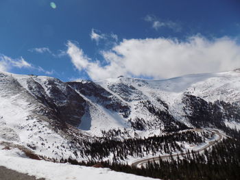 Scenic view of snow covered mountains