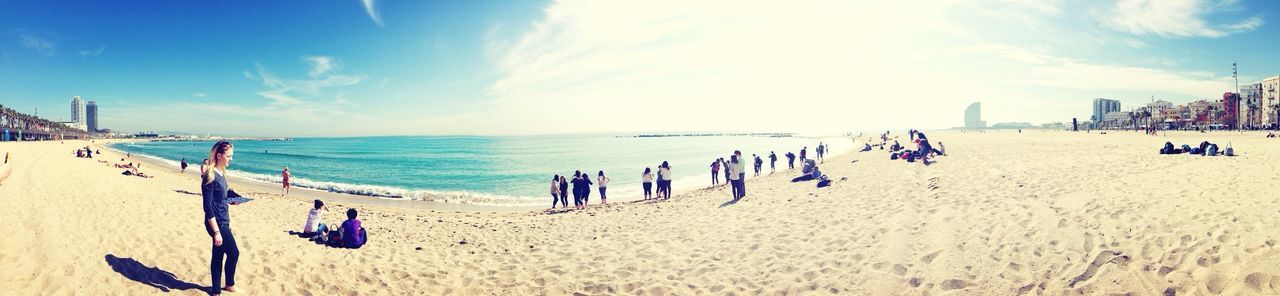 beach, sea, sand, shore, horizon over water, water, sky, vacations, scenics, tranquil scene, tranquility, beauty in nature, beach umbrella, incidental people, nature, blue, summer, parasol, panoramic, cloud - sky