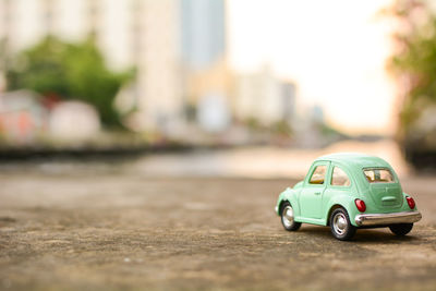 Close-up of toy car on road
