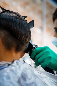 Rear view of people working