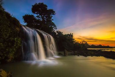 View of waterfall in forest