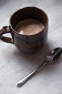 High angle view of vegan latte on table