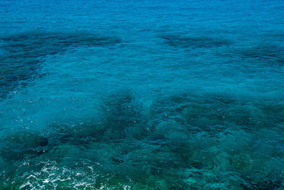 Natural background of transparent, emerald, turquoise sea water