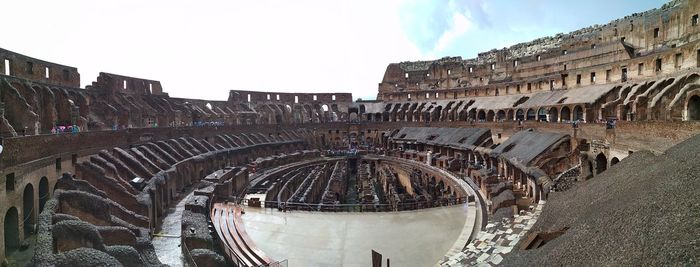 Panoramic view of old amphitheater against sky