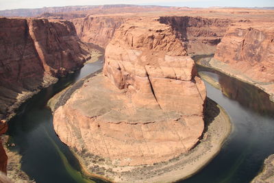 High angle view of rock formations in river