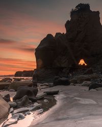Scenic view of rock formation at sunset