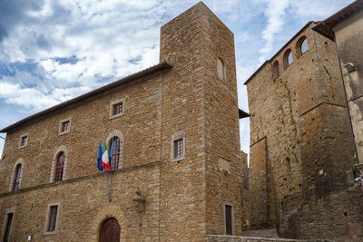 Low angle view of old building against sky