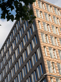 Low angle view of modern building against sky