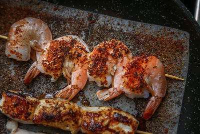 High angle view of meat in cooking pan