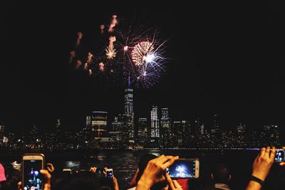 Firework display at night