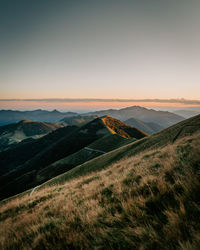 Scenic view of landscape against sky during sunset