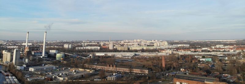 High angle view of buildings against sky in city