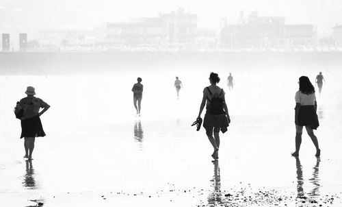 Silhouette of man standing on beach