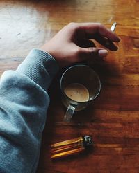 High angle view of coffee cup on table