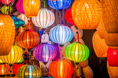 Multi colored lanterns hanging for sale in market