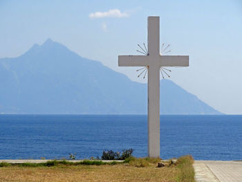 Big cross with athos mountain in the background