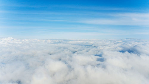 Aerial view of clouds over blue sky