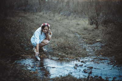 Full length of boy in water