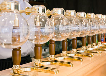 Vacuum coffee makers on table