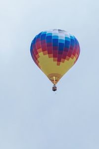 Low angle view of hot air balloon against clear sky