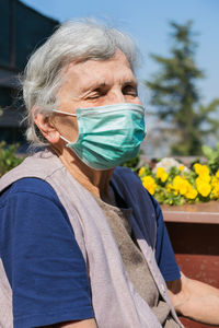 Portrait of woman standing outdoors