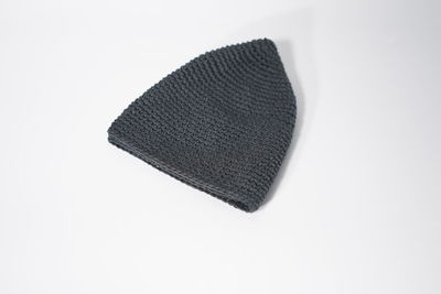 High angle view of hat against white background