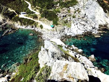 High angle view of rocks by river