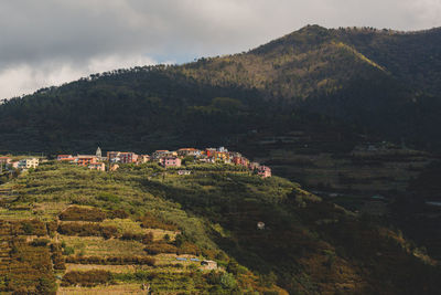 Scenic view of townscape on mountain