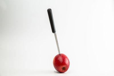 Close-up of apple against white background